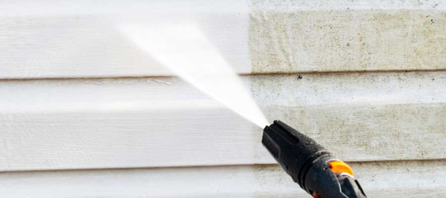 pressure washing cost, pressure washing prices, average cost pressure washing, power washing rates, house washing cost, driveway cleaning price, pressure washing services 2025